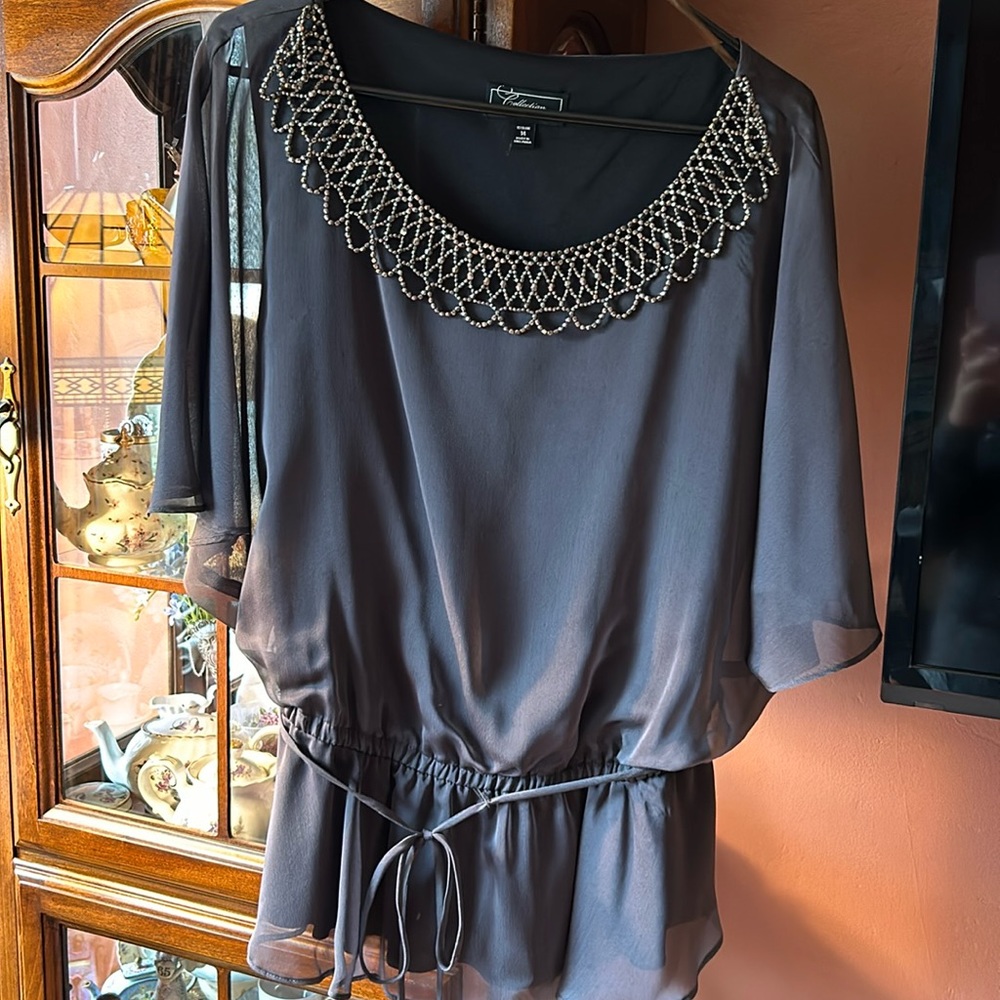 Gorgeous Dressbarn top with camisole under outer top. Beaded bib neckline. EUC.